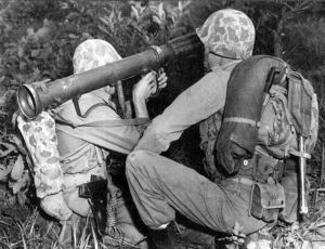 A two man team firing a 3.5 inch rocket launcher.